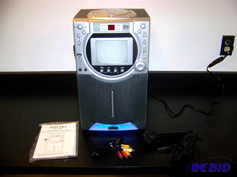 lot 42 image: Spectra, CDG Karaoke System with Built-In Black and White Monitor