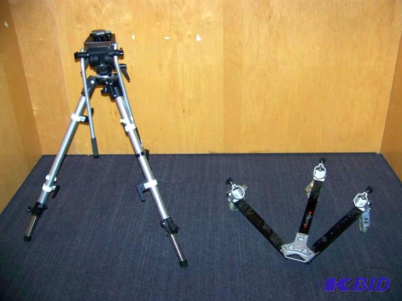 lot 9 image: Bogen Manfrotto, Professional Video Tripod with Head and Bogen Manfrotto, Professional Tripod Spreader  Dolly