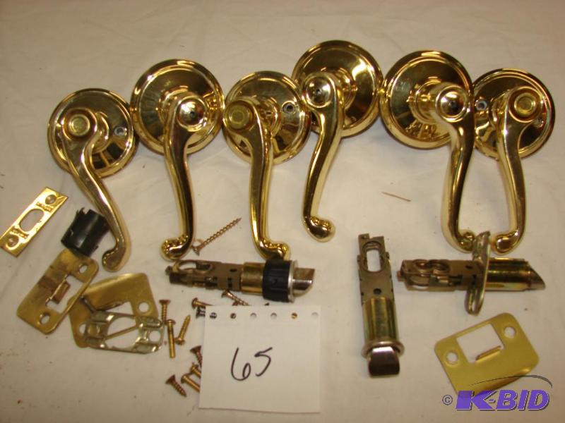 Three Brass Door Handles