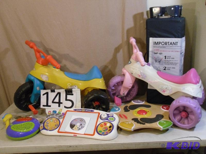lot 145 image: 2 Small Kids Trikes, Graco Pack and...