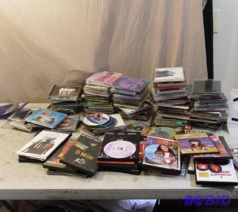 lot 155 image: Lot of Assorted CDs and DVDs. Some ...