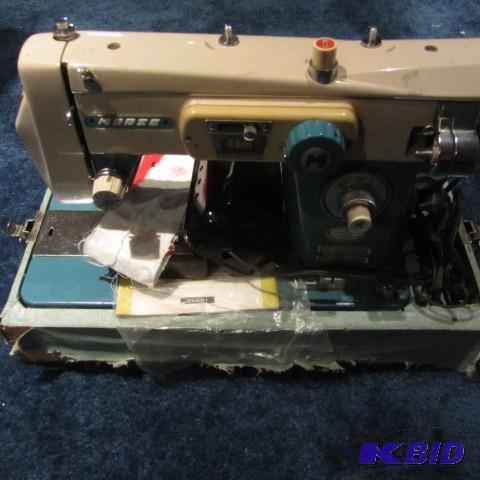 lot 50 image: Portable Sewing Machine