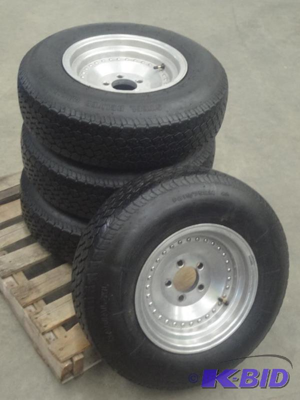 lot 14 image: (4) 5-Lug Aluminum Rims With P2157...