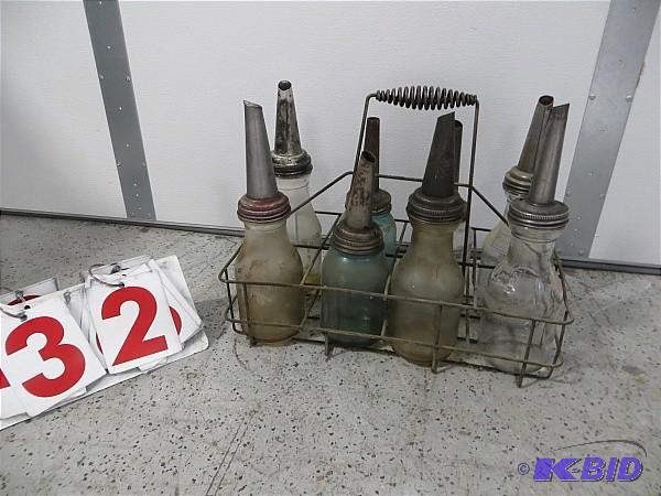 8 antique glass oil jars and spouts...