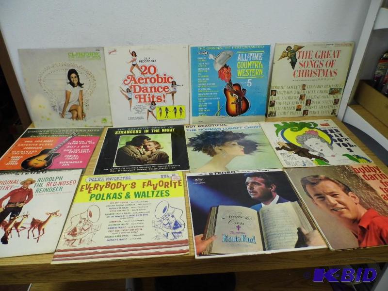 lot 22 image: 12 Assorted Albums