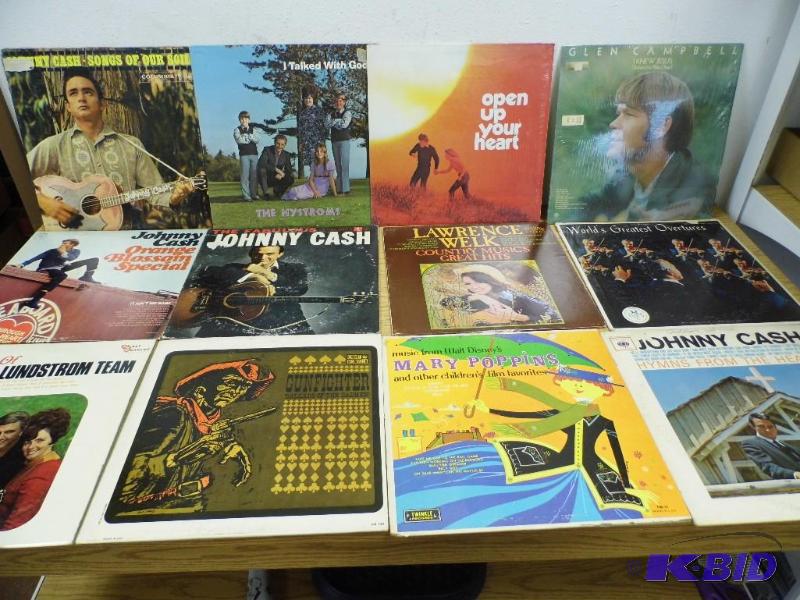 lot 26 image: 12 Assorted Albums