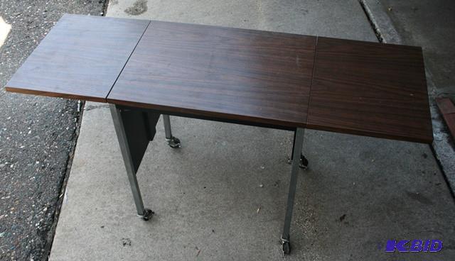 Two sides folding table. Good condi...