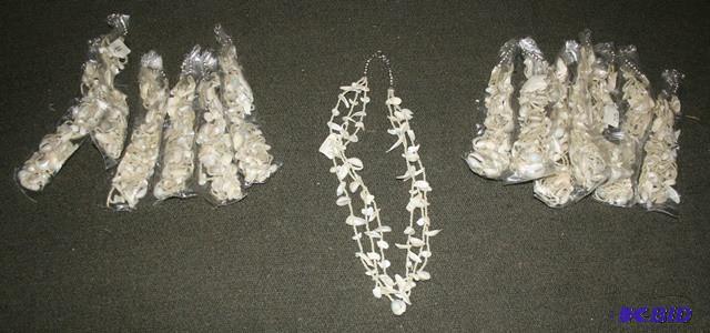 Necklaces made with small shells...
