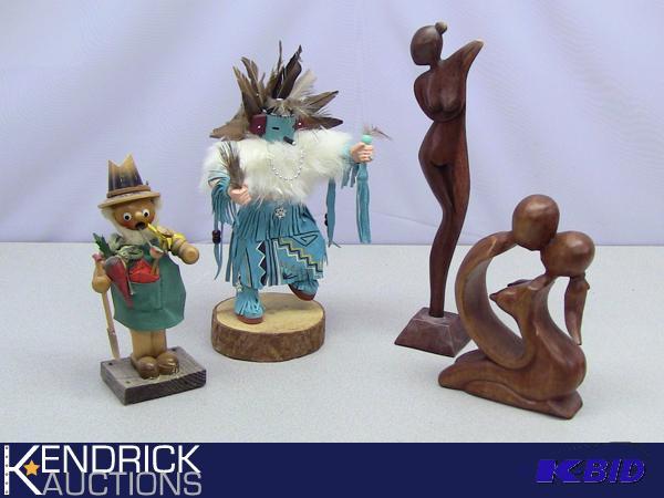lot 35 image: Lot of Folk Art Wood Statues
