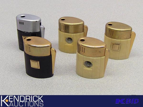 lot 7 image: Large Vintage Remembrance Brown and Bigalow Pipe Lighters