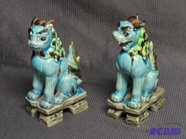 Pair of Foo Dogs, unmarked, one has...
