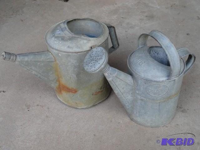 Pair of Galvanized sprinkling cans,...