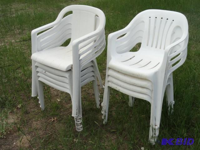 Plastic outdoor chairs, 9 total...