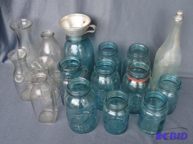 Blue jars with canning funnel, come...