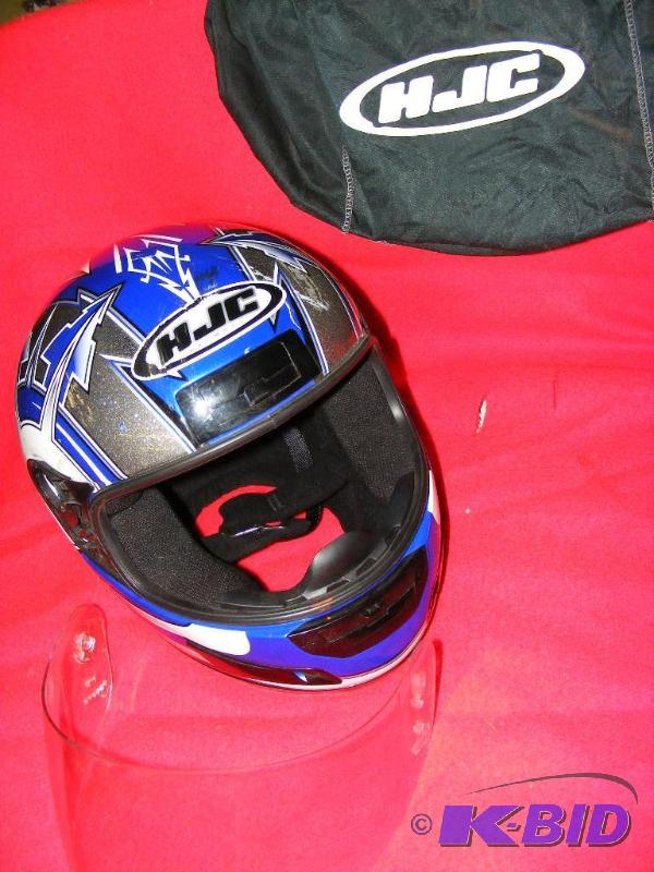 lot 196 image: HJC Helmet, size XL has storage bag...