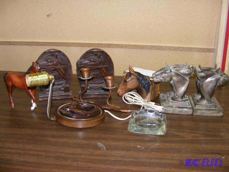 lot 237 image: Metal Horse Head Book ends, one has...