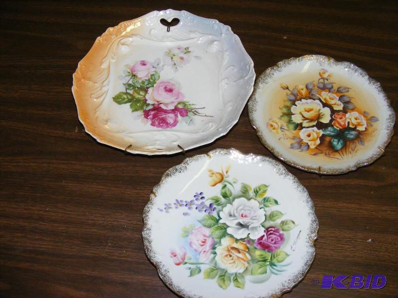 lot 243 image: Three Decorative Flower Plates with...