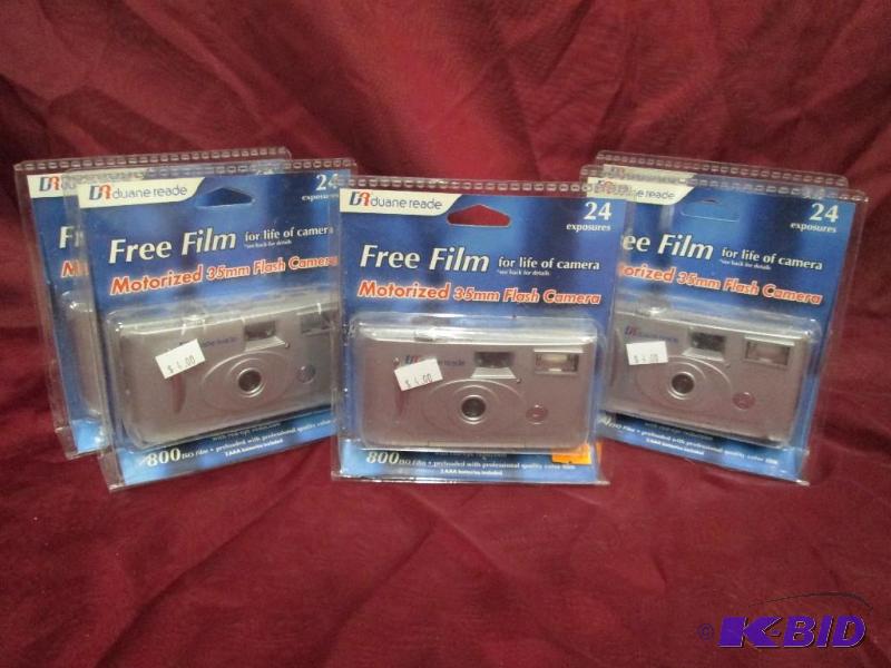 lot 143 image: Lot of 5 new Duane Reade motorized ...