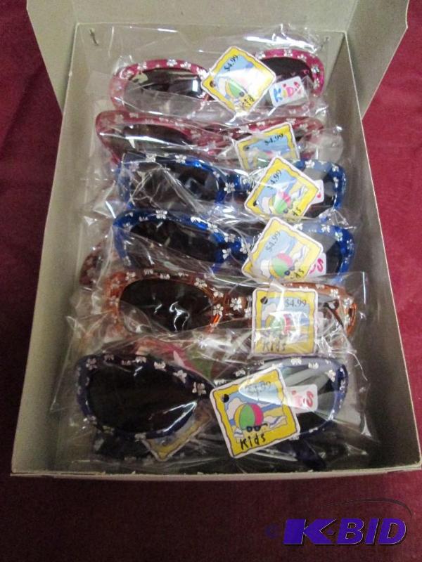 lot 180 image: 12 pair of childrens sunglasses -ne...