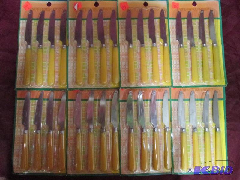 lot 210 image: Lot of 8 packages of table knives. ...