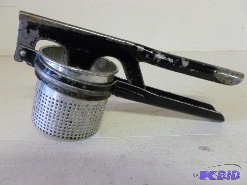 Vintage Universal potato ricer that...