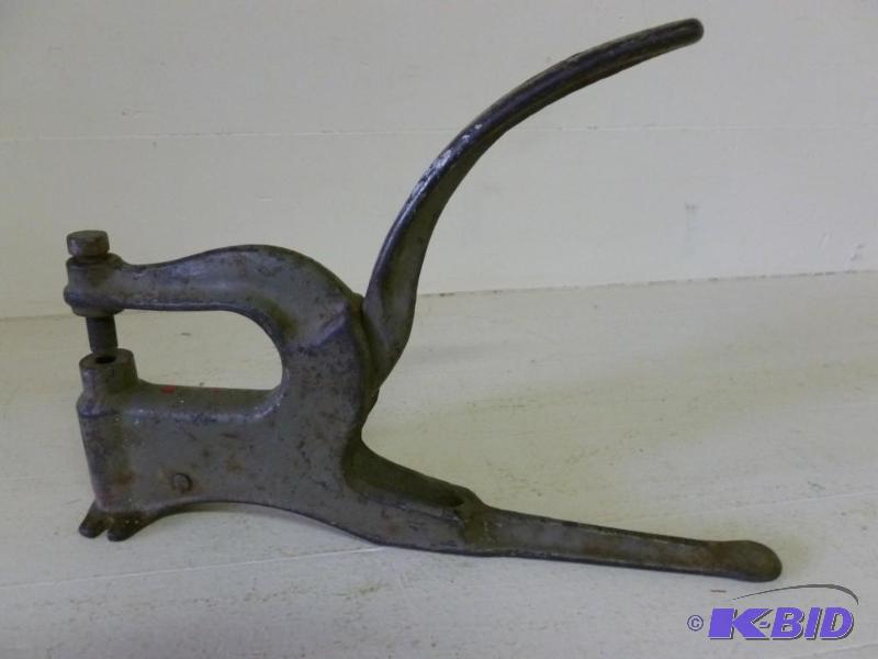 Large vintage cast iron leather pun...