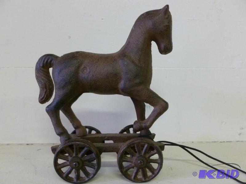 Collectible cast iron horse on wago...