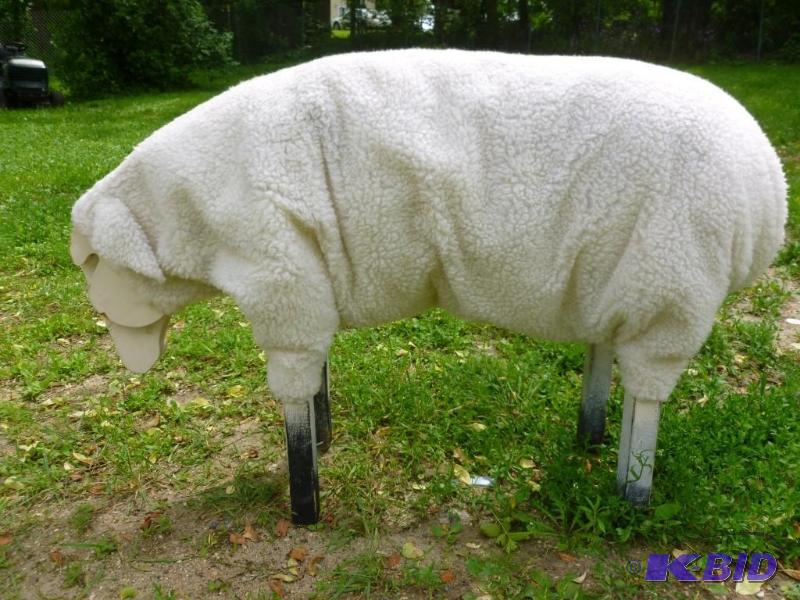 Large wooden bodied and faux wool m...
