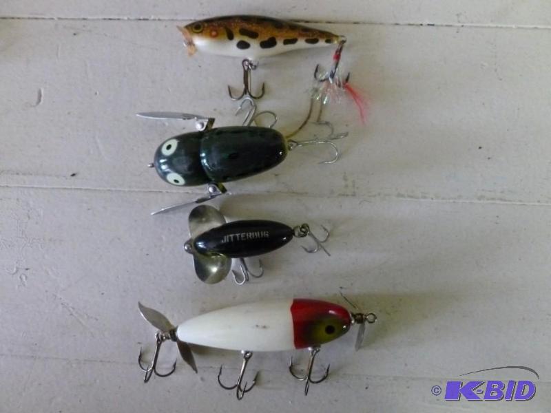 Lot of four plug type fishing baits...