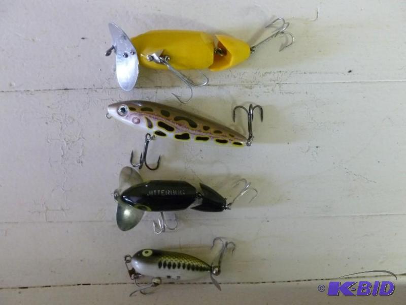 Lot of four plug type fishing baits...