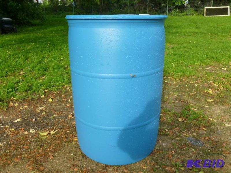 Large 55 gallon plastic drum, comes...