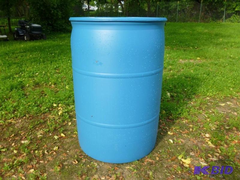 Large 55 gallon plastic drum, comes...