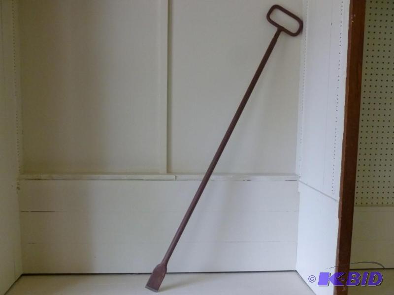 Large heavy steel ice chisel that m...