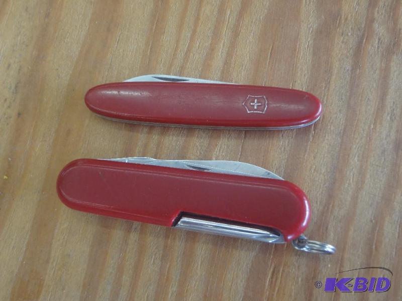 lot 243 image: (2) Original Swis Army Knives...