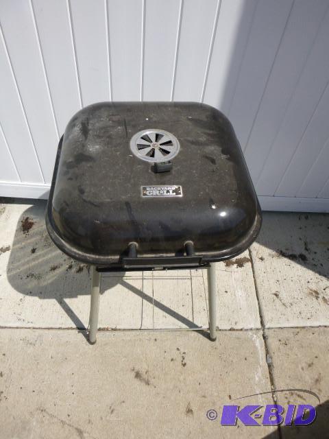 lot 125 image: Backyard Charcoal Grill...