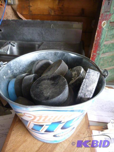 lot 160 image: Pail of Hockey Pucks...