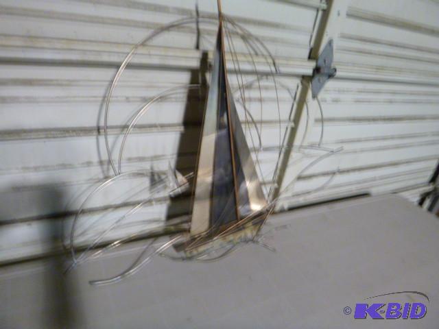 lot 181 image: Metal Sail Boat Wall Hanging...