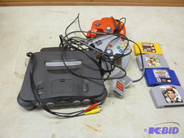 lot 65 image: Nintendo 64 Comes with 2 controller...