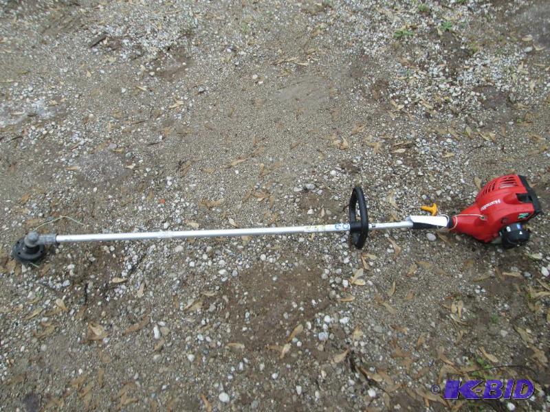 lot 16 image: Homelite Mightylite weed trimmer wh...