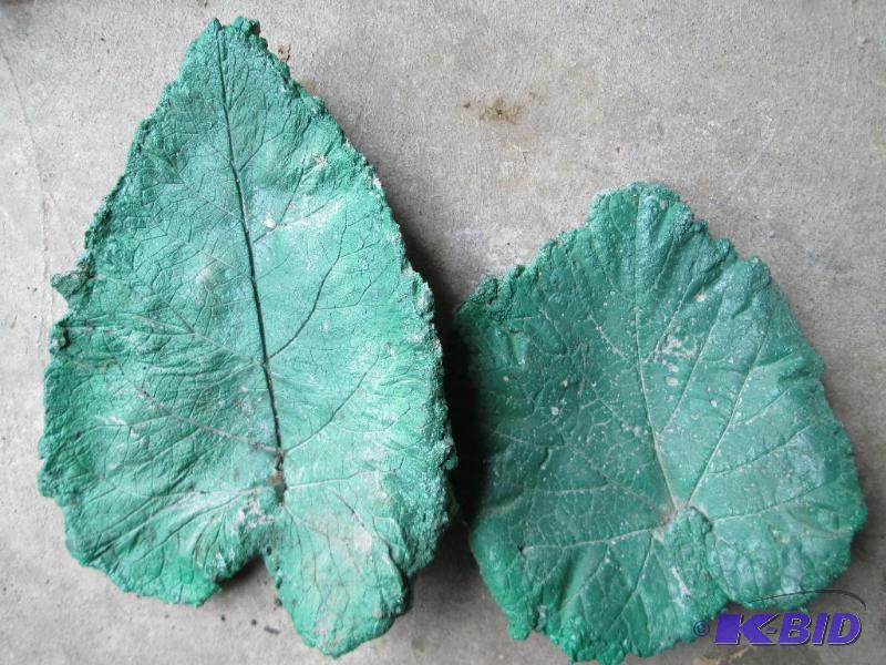 lot 21 image: 2 various size cement leaves, great...