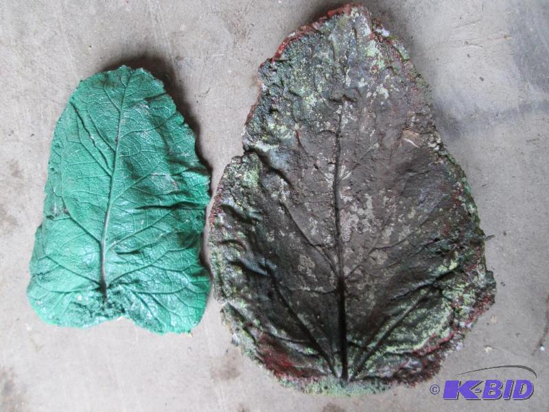 lot 22 image: 2 various size cement leaves, great...