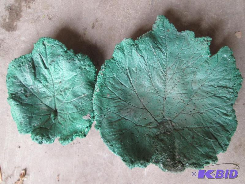 lot 23 image: 2 various size cement leaves, great...