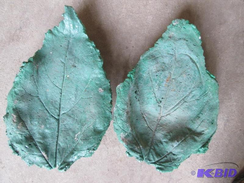 lot 24 image: 2 various size cement leaves, great...