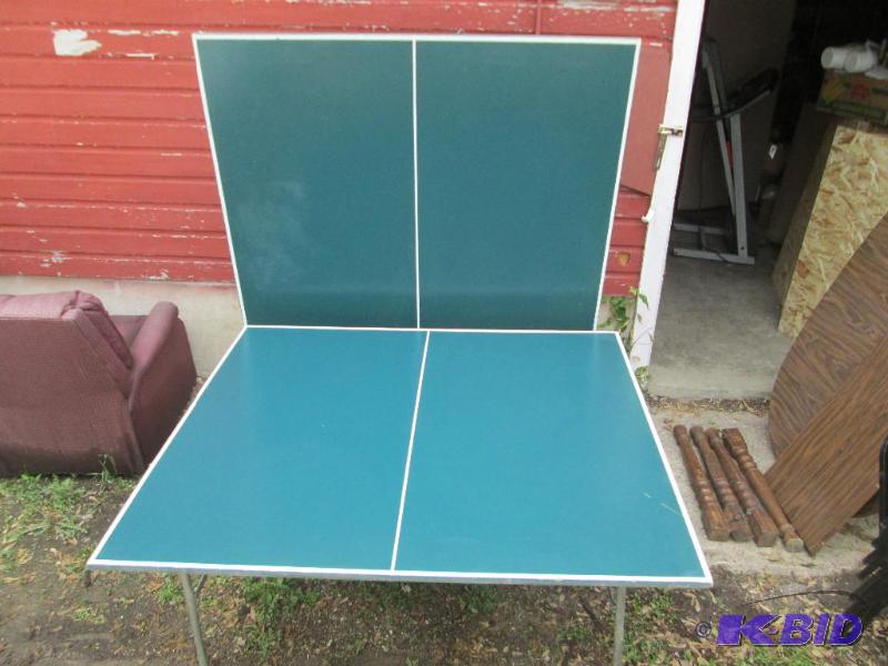 lot 36 image: Folding ping pong table, on wheels ...