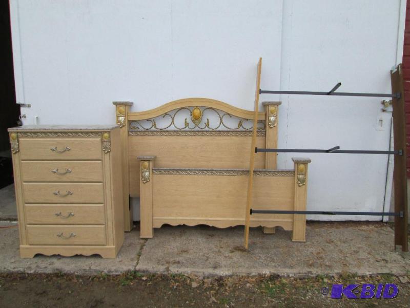 lot 52 image: Post bed and dresser, by Ashley Fur...