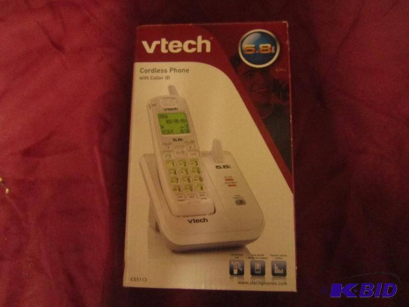 lot 64 image: V-tech 5.8 Ghz cordless phone with ...