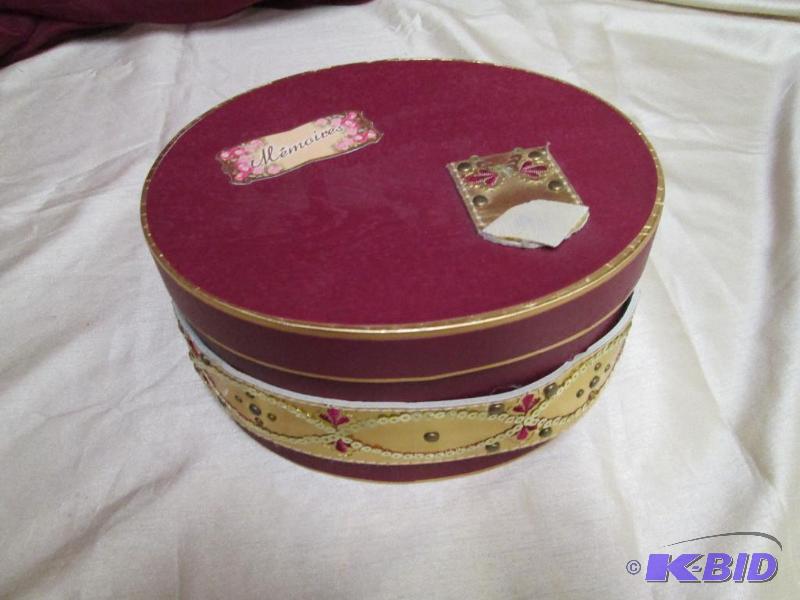 Red oval memory box. Very nice...