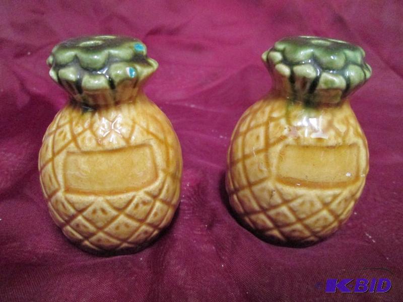 Pair of pineapple shaped salt and p...