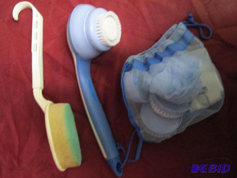 Spin Spa bath brush with attachment...