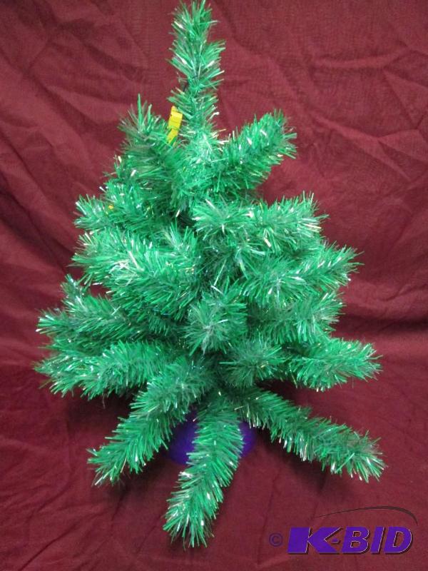 Table top Christmas tree with purpl...